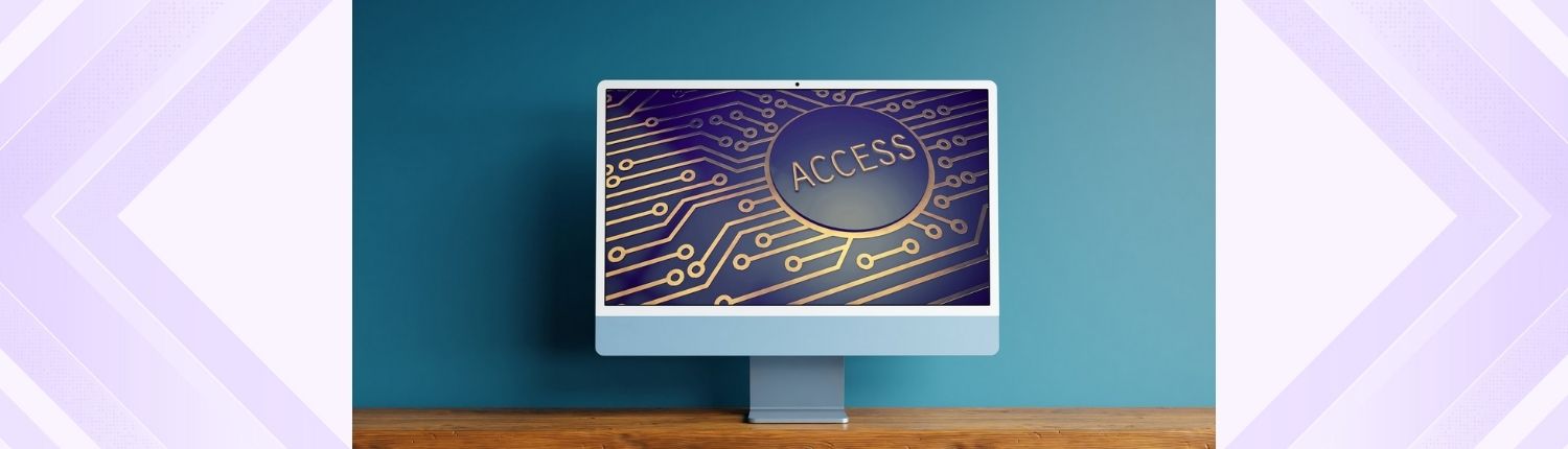 computer monitor on table top showing an image of a circuit board with the word "access" on the screen