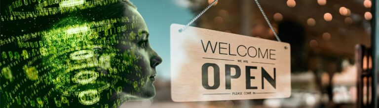 woman's face with technology code behind her facing a "welcome, we're open" sign hanging in a store front window